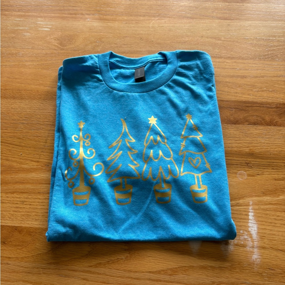 Vibrant Blue Tee with Gold Tree Design
